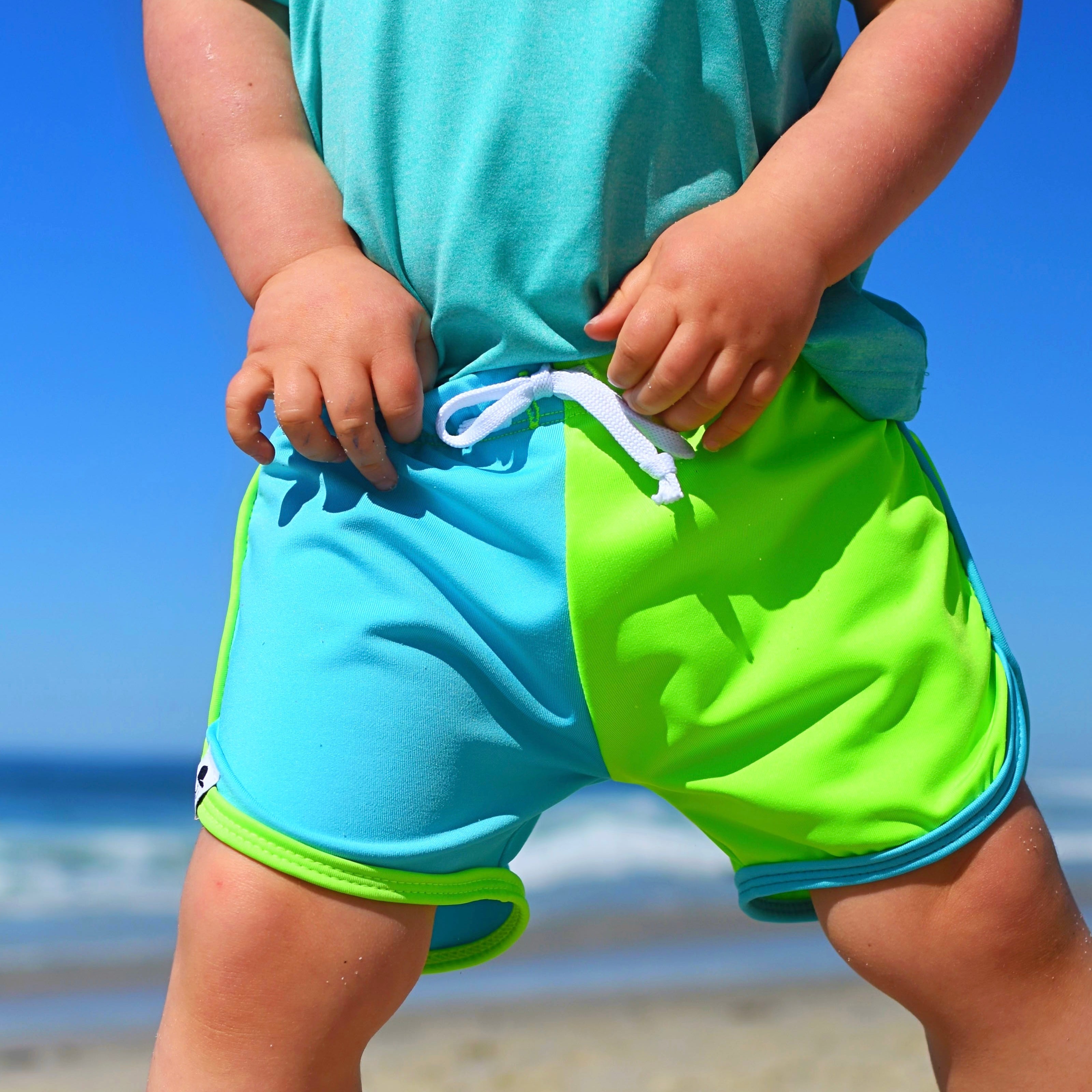 Neon Orange Smiley Track Swim Shorts
