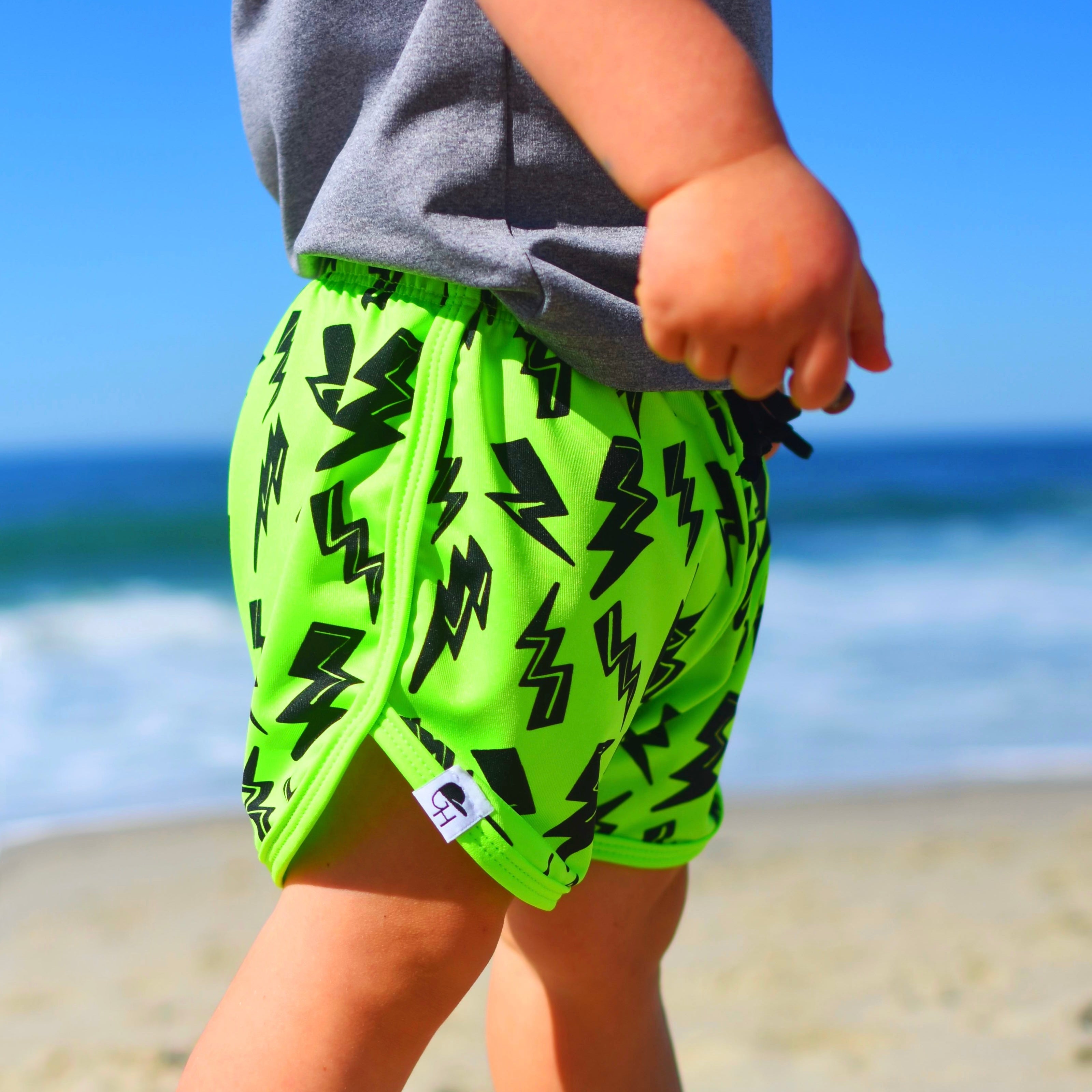 Neon Orange Smiley Track Swim Shorts