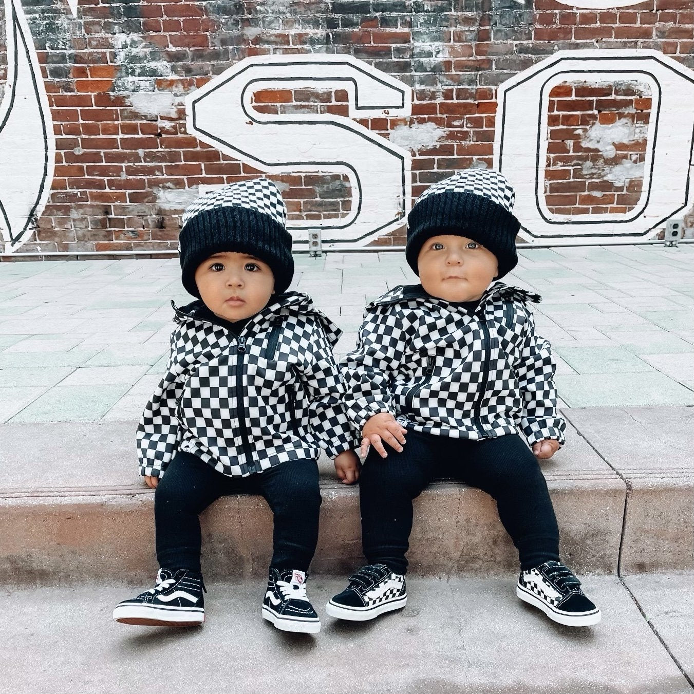 image of two boys sitting on the sidewalk wearing the heck Beanie - George Hats boys winter hats