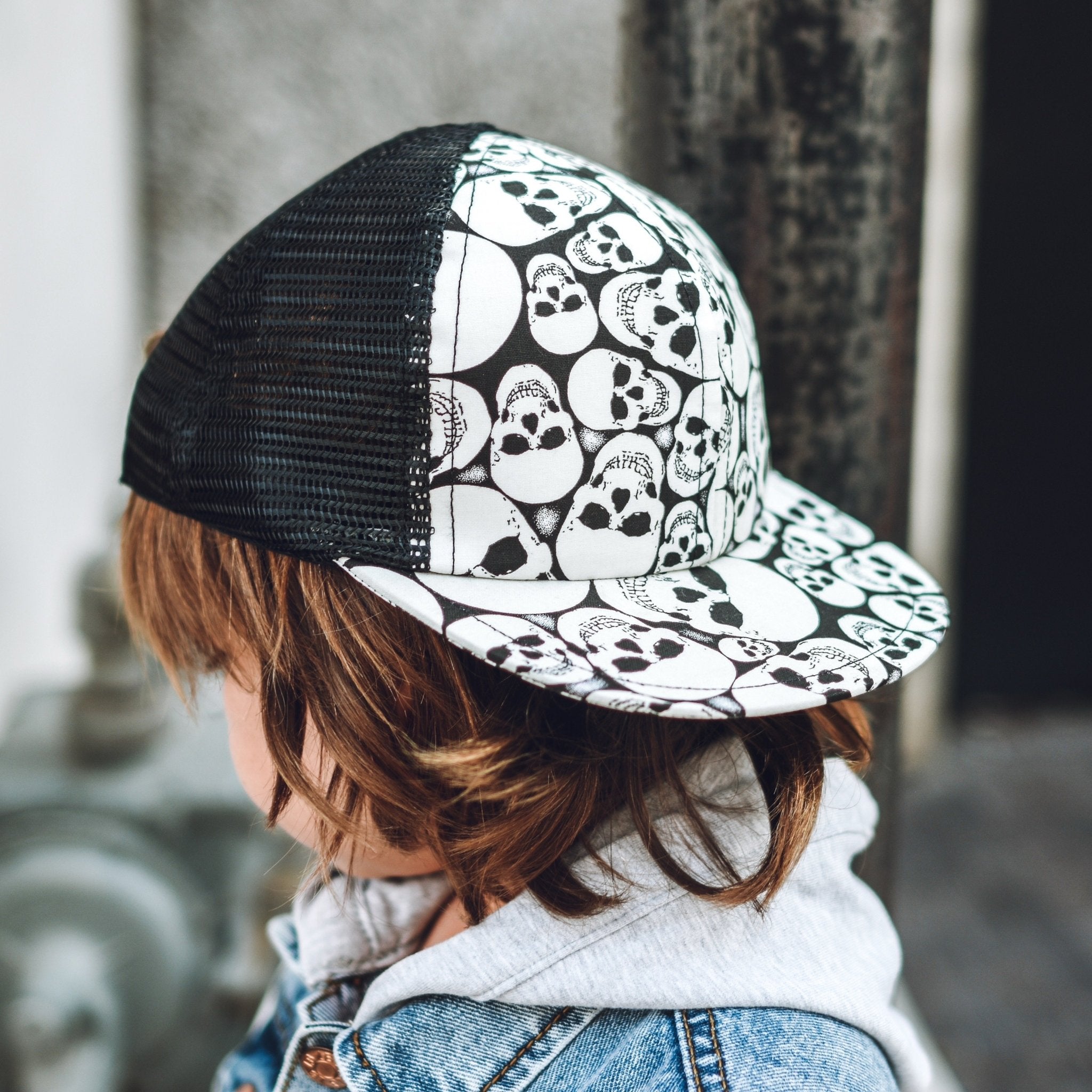 Profile image of the kid's trucker cap with skulls -Glow Skulls Trucker - George Hats