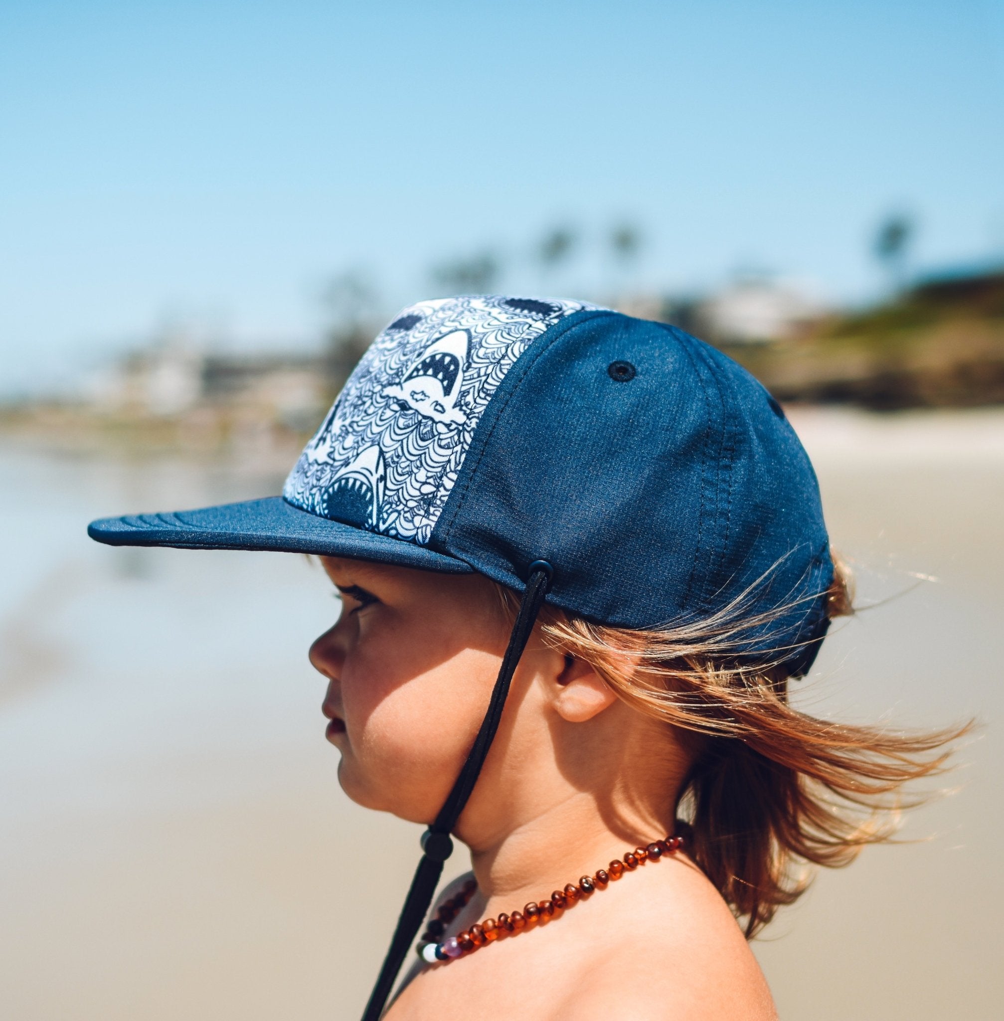An image of a child in the Surf Shark Hat.