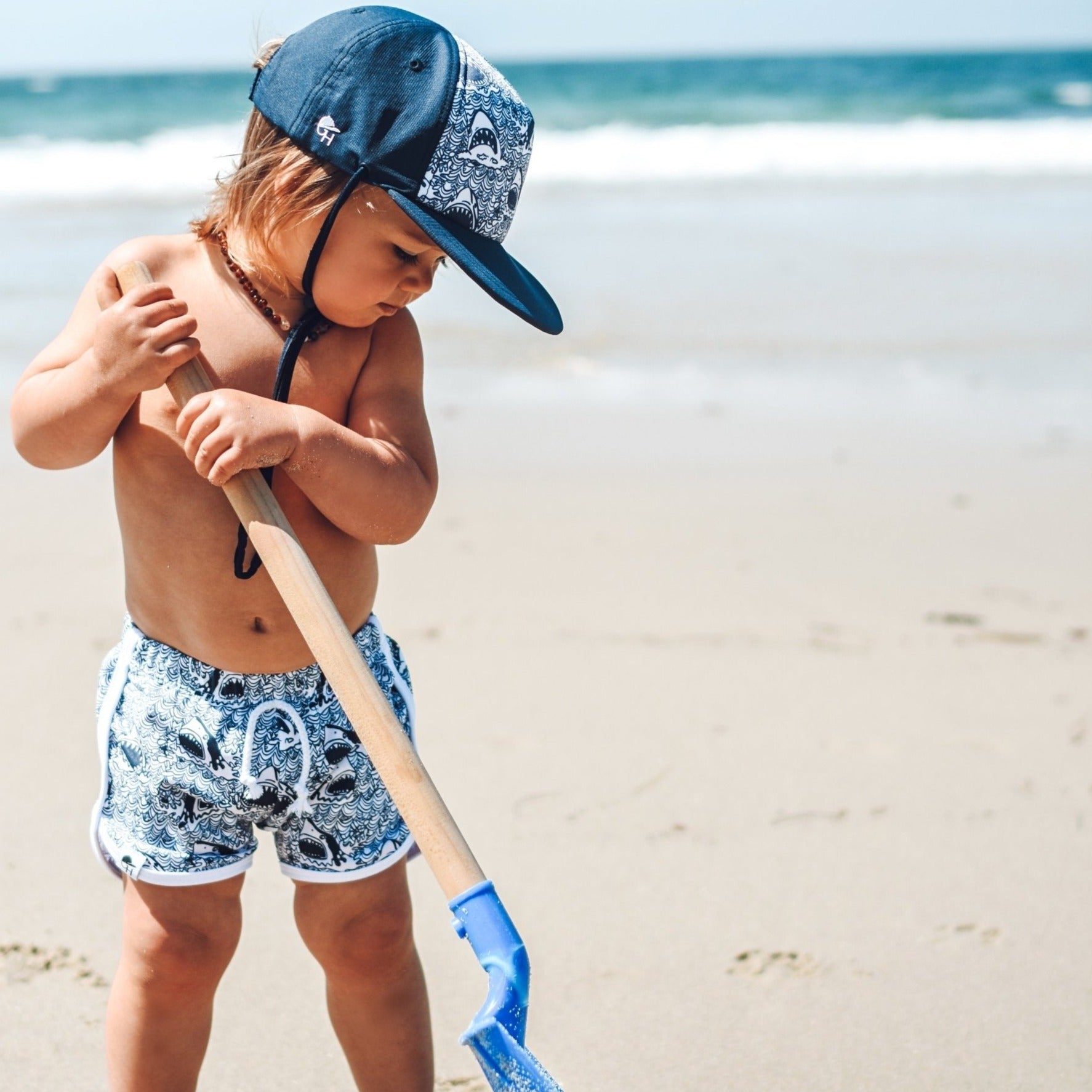An image of a child in the Surf Shark Hat.